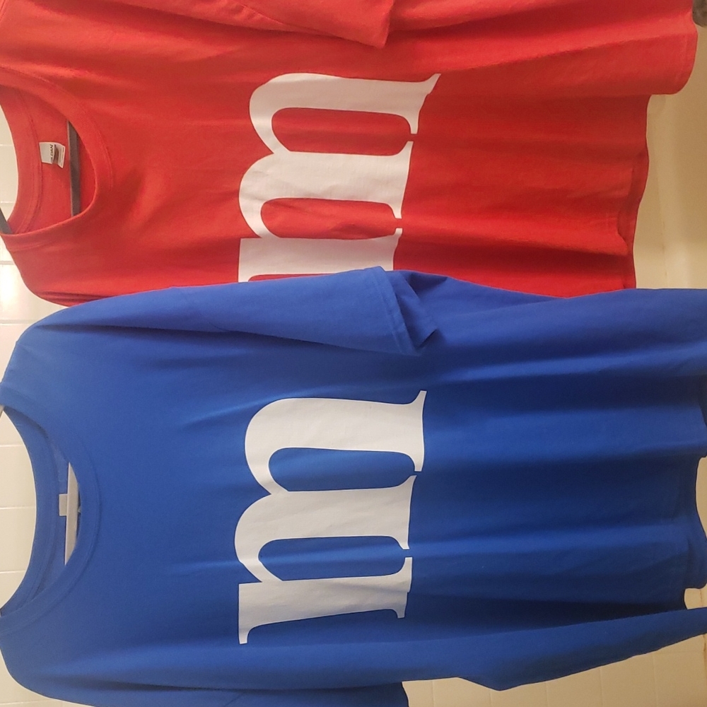 Pair of oversized M&M Tshirts worn as costumes